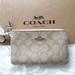 Coach Bags | Coach Signature Double Corner Zip Khaki Wristlet | Color: Cream/Tan | Size: Os