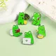 Broches grenouille verte de dessin animé en émail pour écouter de la musique dormir lire