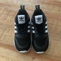 Adidas Shoes | Black And White Adidas Tennis Shoes. Toddler Size 7 | Color: Black/White | Size: 7bb