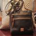 Dooney & Bourke Bags | Dooney & Bourke Black Pebble Leather Crossbody Color Block Bag - Selling At $249 | Color: Black/Brown | Size: 10 1/4" (L) X 10 1/2" (H) X 4" (W)