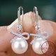 Boucles d'oreilles en argent regardé S925 avec perle d'eau douce naturelle boucles d'oreilles nœud