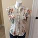 Anthropologie Tops | Anthropologie Maeve Cream With Orange And Green Floral Ruffle Top. Size Xs | Color: Cream/Orange | Size: Xs