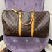 Louis Vuitton Bags | Authentic Louis Vuitton Duffle Bag | Color: Brown/Gold | Size: 21”W X 12” H X 9”D 4.5 Inch Drop