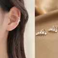 1 paire de boucles d'oreilles en perles pour femmes et filles élégantes Clip de Cartilage sans