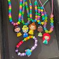 Disney Accessories | 5 Disney Princess Necklaces With Beads And 1 Dumbo The Elephant Bracelet | Color: White | Size: Osg