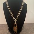 Louis Vuitton Jewelry | Authentic Louie Vuitton Brass Lock & Key Necklace | Color: Gold | Size: Os