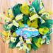 The Holiday Aisle® 23" Deco Mesh Wreath Burlap/Deco Mesh in Green/White/Yellow | 23 H x 23 W x 5 D in | Wayfair C776B2241CBA47D79E5FC9543F3FBA5C