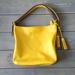 Coach Bags | Coach Legacy Lemon Tassel Shoulder Bag | Color: Yellow | Size: Os