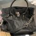 Michael Kors Bags | Black Classic Michael Kors Bag. Used In Amazing Condition Heavy Amazing Quality | Color: Black/Silver | Size: Os