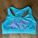 Nike Intimates & Sleepwear | Nike Turquoise Sports Bra Size Xs With Hot Pink Nike Lettering On Front Euc | Color: Blue/Pink | Size: Xs