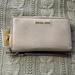 Michael Kors Bags | Micheal Kors Soft Pink Lg Flat Mf Phone Case Wristlet Nwt | Color: Pink | Size: Large
