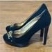 Michael Kors Shoes | Michael Kors Black Suede Heels 4.5” With Gold Mk Emblem Very Good Cond. Size 7. | Color: Black | Size: 7