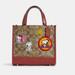 Coach Bags | Coach X Peanuts Dempsey Tote 22 In Signature Canvas With Patches | Color: Brown/Tan | Size: 22