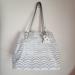 Jessica Simpson Bags | Jessica Simpson Ivory Laser Cut Vegan Leather Scallop Edge Shoulder Bag. | Color: Cream | Size: Os