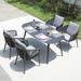 Corrigan Studio® Huriel Oval 4 - Person 66.92" Long Outdoor Dining Set w/ Cushions Metal/Wicker/Rattan in Gray | 66.92 W x 35.43 D in | Wayfair