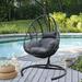 Dakota Fields Chanay Wicker Hanging Chair Swing, Porch Swing Chair w/ Stand, Metal Frame & UV Resistant Cushion Wicker/Rattan in Black | Wayfair