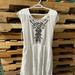Free People Dresses | Free People White Dress With Black Cut Outs And Embellishments | Color: Black/White | Size: L