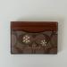 Coach Bags | Coach Card Case In Signature Canvas With Snowflake Print | Color: Brown | Size: Os