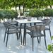 Corrigan Studio® Ishmul Square 4 - Person 31.5" Long Outdoor Dining Set Stone/Concrete/Wicker/Rattan in Gray | 31.5 W x 31.5 D in | Wayfair