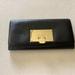 Michael Kors Bags | Micheal Kors Wallet Nwot | Color: Black/Gold | Size: 7 3/4” X 4”