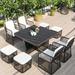 Bayou Breeze Aguste Square 4 - Person 47.2" Long Outdoor Dining Set w/ Cushions Stone/Concrete/Wicker/Rattan in Black/Gray | 47.2 W x 47.2 D in | Wayfair