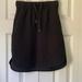 Lululemon Athletica Skirts | Lululemon On The Fly Black Skirt Size: 2 | Color: Black | Size: 2