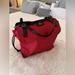 Burberry Bags | Burberry Buckleigh Red Nylon Tote With Black Leather Trim | Color: Black/Red | Size: Os