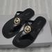 Michael Kors Shoes | Michael Kors Black Pre Owne Size 9.5 | Color: Black/Gold | Size: 9.5