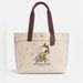 Coach Bags | Coach X Peanuts Tote In Canvas With Snoopy Ice Skate Motif Nwt | Color: Cream/White | Size: Os