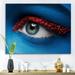 DESIGN ART Designart Female Eye With Blue Paint On Face & Red Balls Modern Canvas Wall Art Print 40 in. wide x 30 in. high