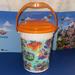 Disney Other | Disney Parks Popcorn Bucket W Lid Exclusive | Color: Orange/White | Size: 7 Inches High, 18 Inches Around