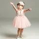 Robe formelle et élégante pour bébé de 1 à 2 ans tenue de fête d'anniversaire à fleurs blanches et