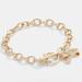 Coach Jewelry | Coach Bow Bracelet | Color: Gold | Size: Os