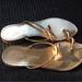 Louis Vuitton Shoes | Louis Vuitton Gold Bow Sandals Size 37 | Color: Gold | Size: 7