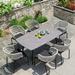 Corrigan Studio® Hebron Rectangular 6 Person 62.99" Outdoor Dining Set w/ Cushions Stone/Concrete/Wicker/Rattan in Gray | 62.99 W x 35.43 D in | Wayfair