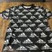 Adidas Shirts | Adidas Black Tee With White Scattered Logo - Size Large | Color: Black/White | Size: L