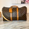 Louis Vuitton Bags | Louis Vuitton Keepall Bandouliere 45 | Color: Gold/Tan | Size: 17.7 X 10.6 X 7.9 In. (Length X Height X Width)