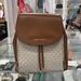 Michael Kors Bags | Michael Kors Backpack Bag Phoebe Medium Flap Drawstring Backpack Vanilla Nwt | Color: Cream/Gold | Size: Medium