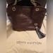 Louis Vuitton Bags | Louis Vuitton Limited Edition Paris Souple Whisper Leather Gm Bag $1,795 | Color: Brown/Gold | Size: Os