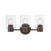 Westinghouse Lighting 6126500 Sylvestre Three Light Wall Fixture with Clear Seeded Glass Walnut