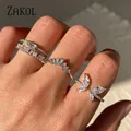 Zakol glänzende Schmetterling Zirkon Ringe für Frauen Mädchen koreanischen minimalist ischen Ehering