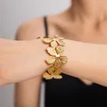 Ensemble de bijoux en acier inoxydable plaqué or 18 carats pour femme bracelet fleur exagérée