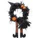 Haunted Hill Farm Halloween Black and Orange Floral Wreath with Pumpkins, Witch's Hat, Broom, and Legs for House Decoration