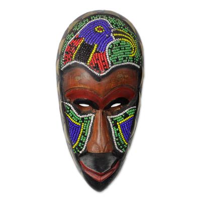 Serie,'Beaded Wood African Mask with Bird Motif'