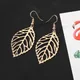 Boucles d'oreilles évidées en forme de goutte de cuir chevelu pour femmes boucles d'oreilles à