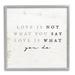 Stupell Industries Love Is What You Do Phrase Framed On Wood Graphic Art Wood in Brown/White | 17 H x 17 W x 1.5 D in | Wayfair ax-313_gff_17x17