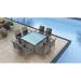 Wade Logan® Suffern Square 4 - Person Long Outdoor Dining Set w/ Cushions Glass, Wicker in Blue/Gray | 29.5" H x 59" W x 59" L | Wayfair