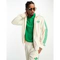 adidas Originals adicolor 70's monogram tracktop in off white