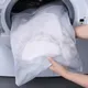 Grand sac à linge en maille blanc durable pour laver ses sous-vêtements ses chaussettes ses