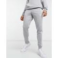 adidas Originals adicolor three stripe skinny joggers in grey heather